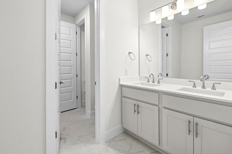 Furnished interior view inside a new home in Riverstone, Georgetown (Image 11).