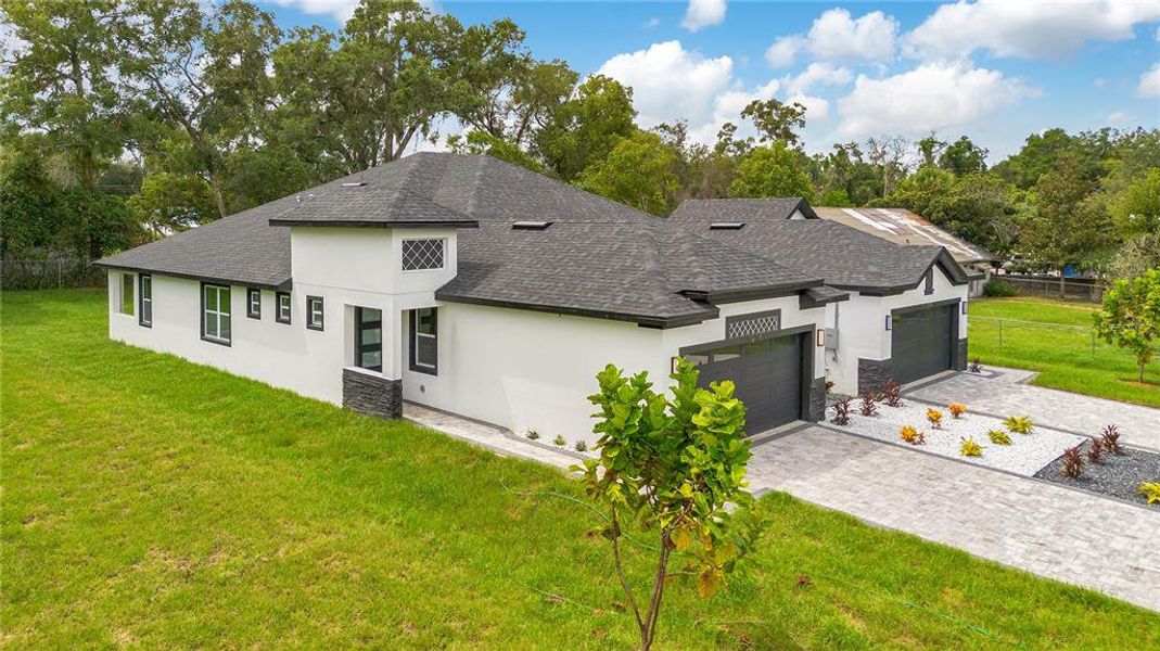 Front exterior of a new home in , Apopka, FL, highlighting curb appeal (Image 41).