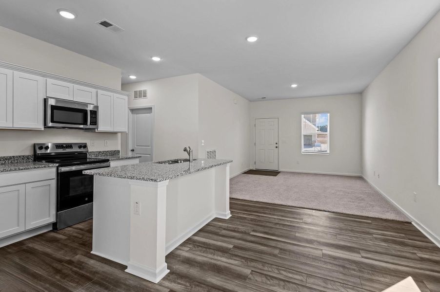 Representative furnished interior of a home built from the Falcon by Starlight Homes in Williams Landing, Waller (Image 10).