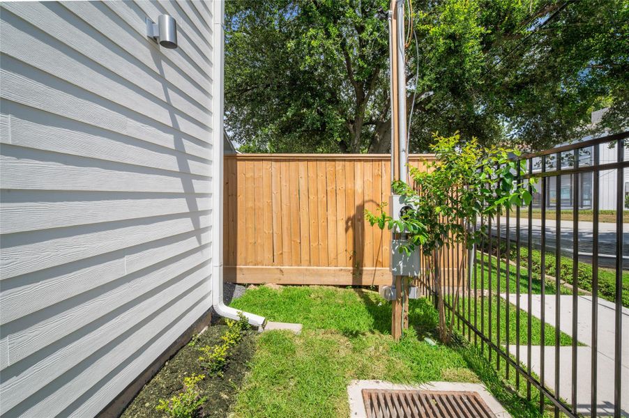 Exterior details and patio area of a home in , Houston (Image 25).