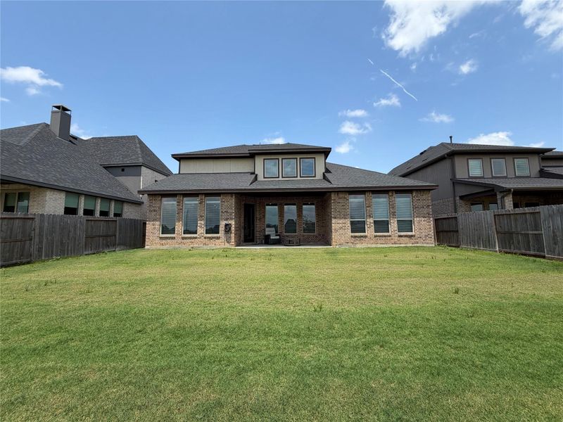 Exterior details and patio area of a home in Cross Creek West, Fulshear (Image 3).