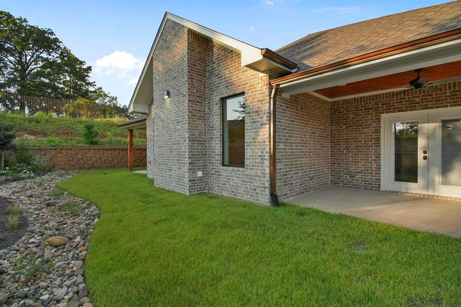 Exterior details and patio area of a home in , Tyler (Image 3).