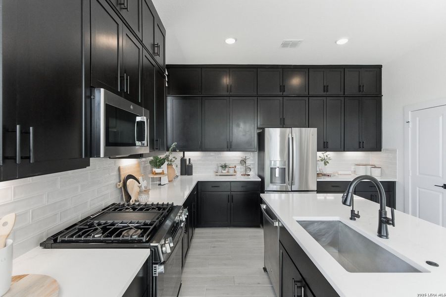 Furnished interior view inside a new home in Centero at Stone Oak, San Antonio (Image 10).