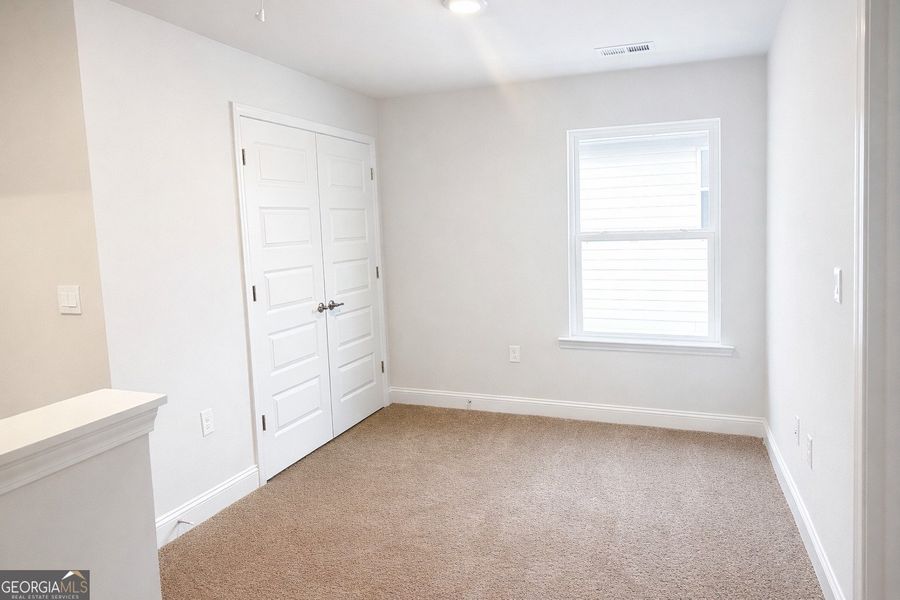 Spacious, unfurnished interior of a new home in Canterbury Villas, Carrollton (Image 15).