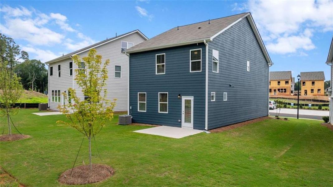 Exterior details and patio area of a home in Walden Park - The Retreat, Jonesboro (Image 29).