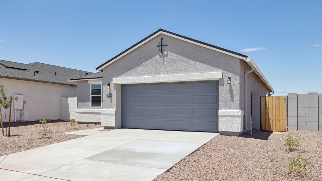 Front exterior of a new home in Quail Ranch, San Tan Valley, AZ, highlighting curb appeal (Image 23). Front exterior of a new home in Quail Ranch, San Tan Valley, AZ, highlighting curb appeal (Image 23).