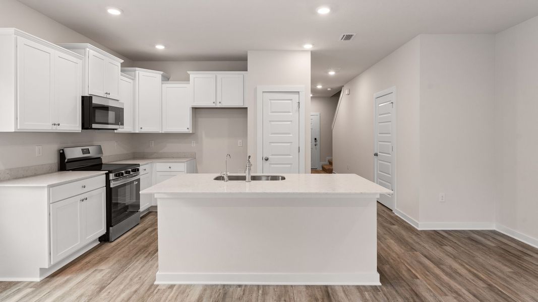 Representative furnished interior of a home built from the Palm Exterior by D.R. Horton in Genoa Landing Townhomes, Freeport (Image 7).