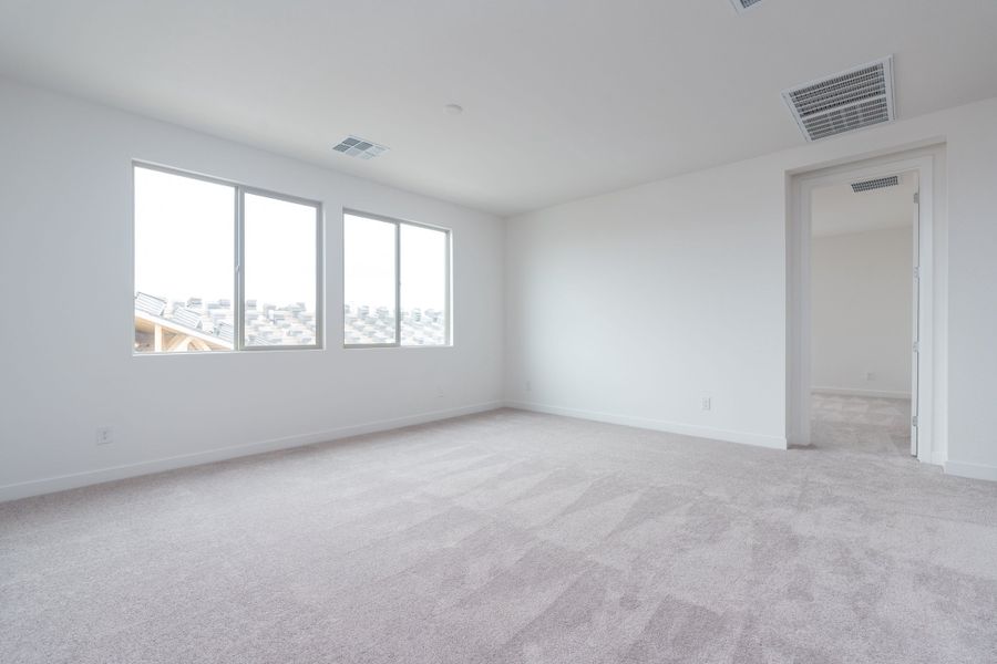 Spacious, unfurnished interior of a new home in Soleo, Queen Creek (Image 9).
