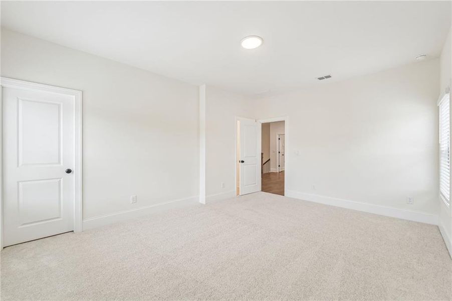 Spacious, unfurnished interior of a new home in Waterhaven, Cumming (Image 27).