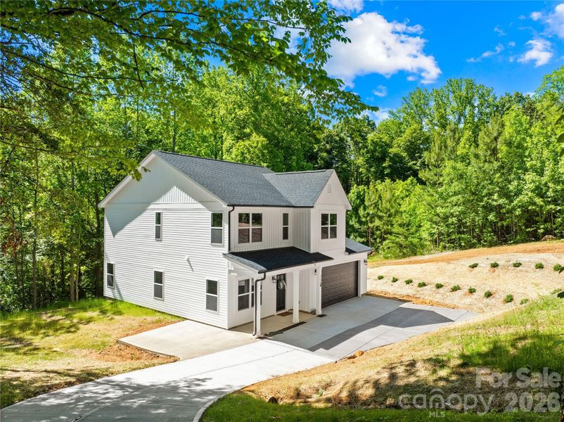 Front exterior of a new home in , Kings Mountain, NC, highlighting curb appeal (Image 23).