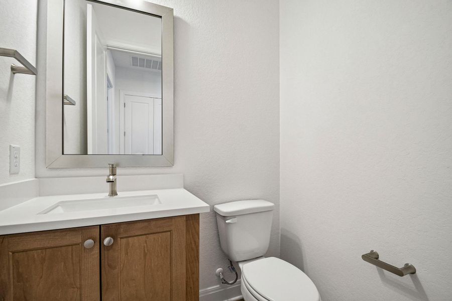 Furnished interior view inside a new home in 6 Creeks, Kyle (Image 7).