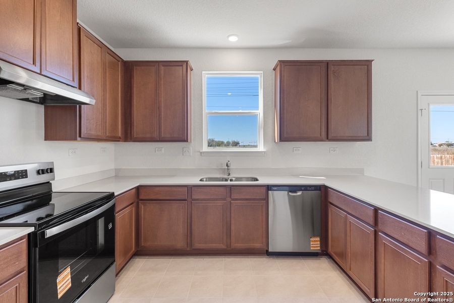 Furnished interior view inside a new home in Southton Cove, Seguin (Image 6).