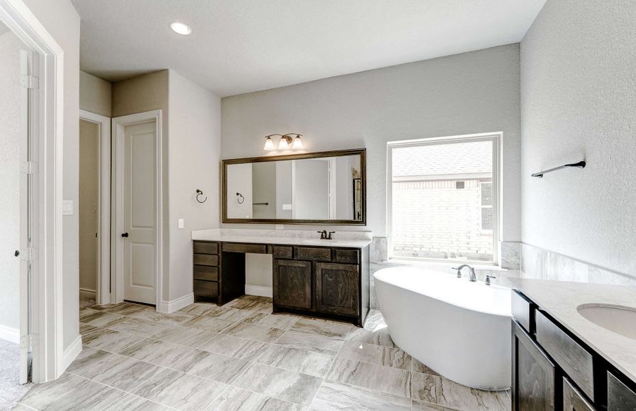 Representative furnished interior of a home built from the 3799 by Ravenna Homes in Artavia 70′, Conroe (Image 16).