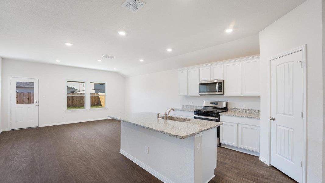 Furnished interior view inside a new home in Carillon, Manor (Image 6).