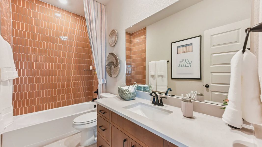 Representative furnished interior of a home built from the Peyton by Chesmar Homes in The Grove at Blackhawk, Pflugerville (Image 41).