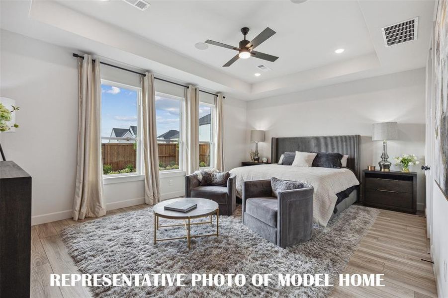 You'll find peaceful and relaxing owner's suites in all of our floor plans in Windsong Ranch!  REPRESENTATIVE PHOTO OF MODEL HOME