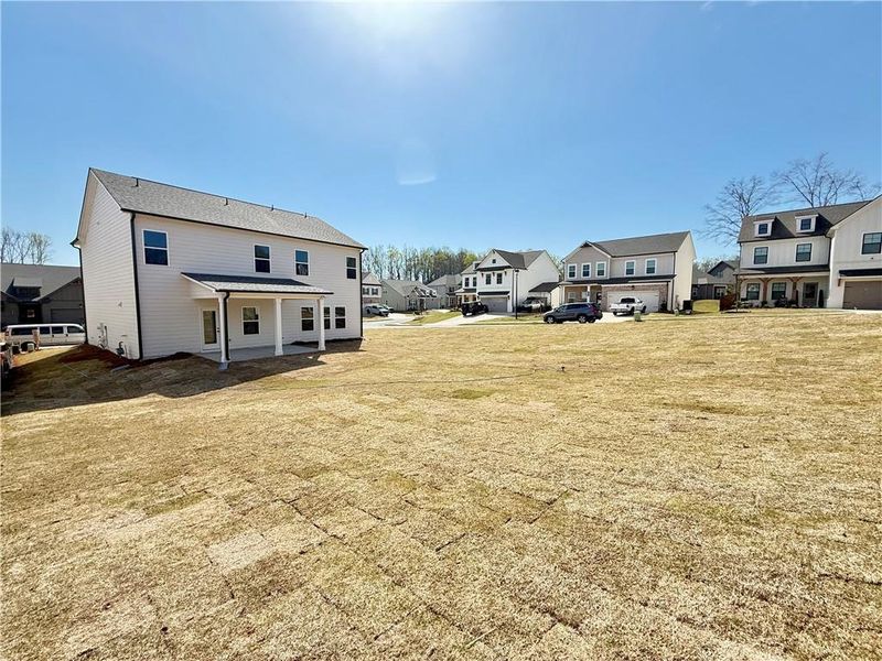 Exterior details and patio area of a home in Ponderosa Farms Estates, Gainesville (Image 24).