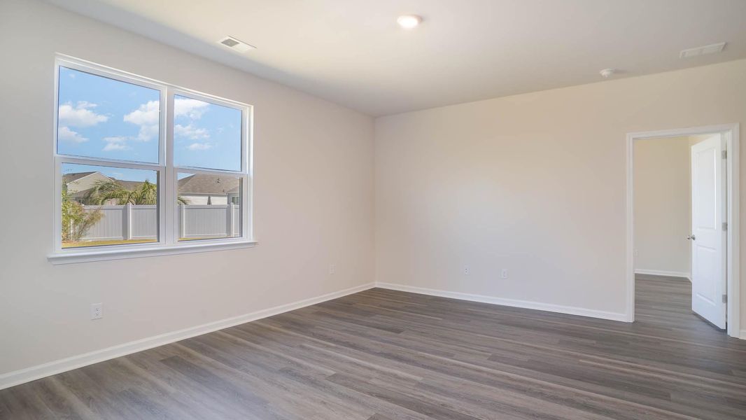 Representative unfurnished interior of a home built from the KERRY by D.R. Horton in Sandridge Park, Little River (Image 14).