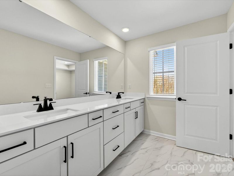 oversized dual vanity with quartz .countertops.