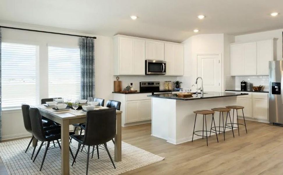 Photo is not of the actual home, but is an inspirational photo of builder’s model home and may depict options, furnishings, and/or decorator features that are not included