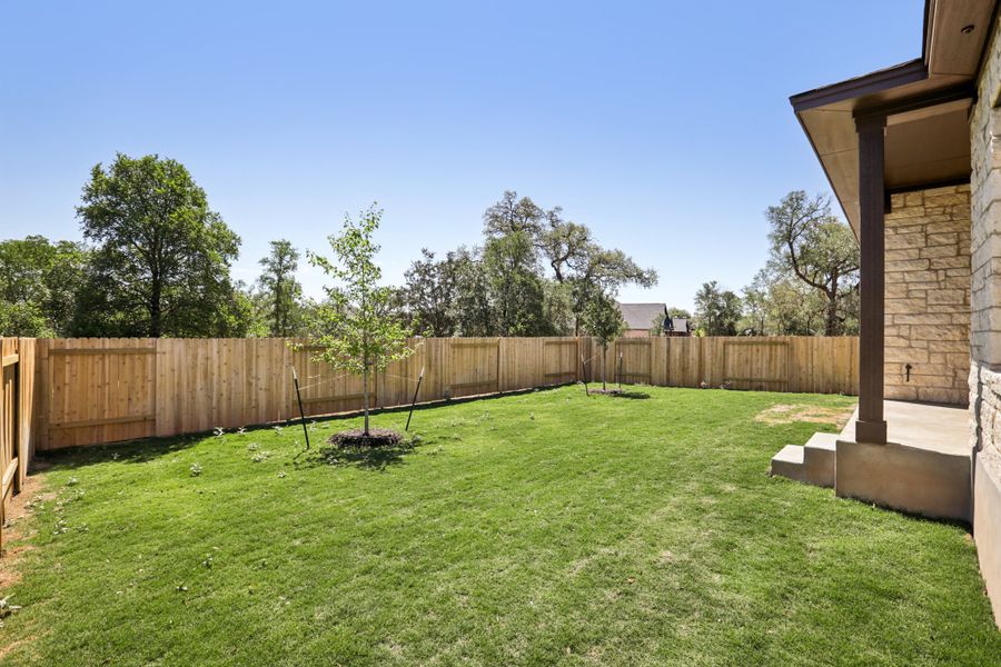 Exterior details and patio area of a home in Persimmon, Buda (Image 15).