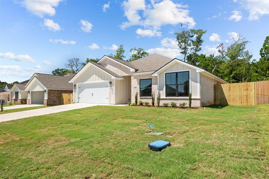 Front exterior of a new home in , Lindale, TX, highlighting curb appeal (Image 16).