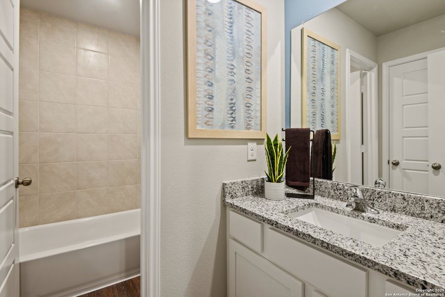 Furnished interior view inside a new home in Cinco Lakes, San Antonio (Image 6).
