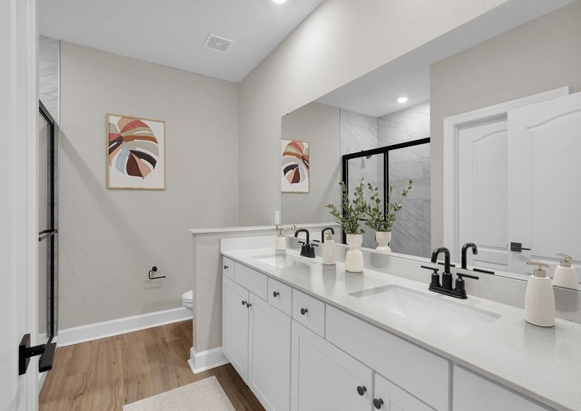 Get ready for your day in the master bathroom