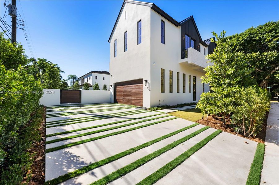 Front exterior of a new home in , Miami, FL, highlighting curb appeal (Image 19). Front exterior of a new home in , Miami, FL, highlighting curb appeal (Image 19).