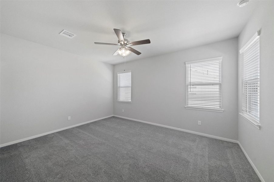 Spacious, unfurnished interior of a new home in Sunterra, Katy (Image 13).