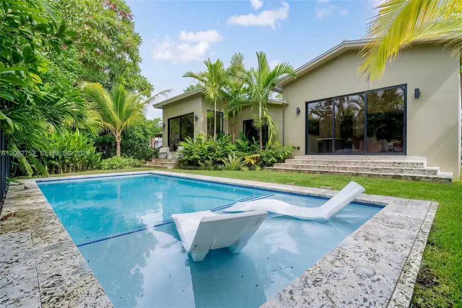 Exterior details and patio area of a home in , Miami (Image 1). Exterior details and patio area of a home in , Miami (Image 1).