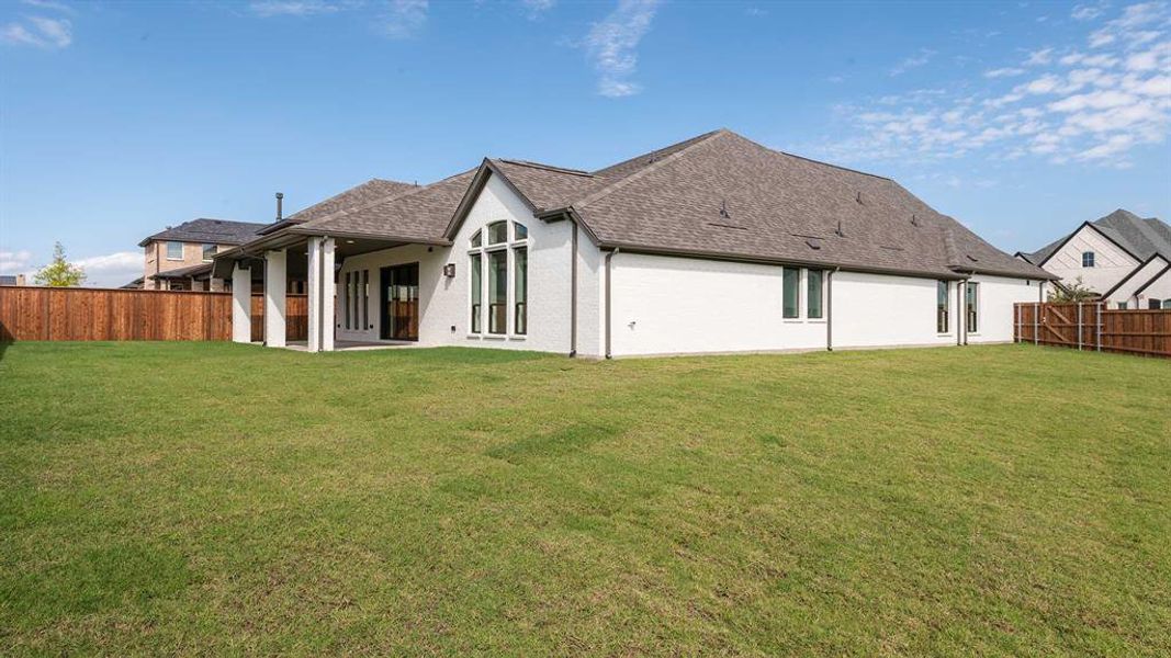 Exterior details and patio area of a home in North Sky 55', Celina (Image 2).