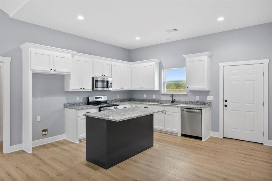 Furnished interior view inside a new home in , Ennis (Image 5).