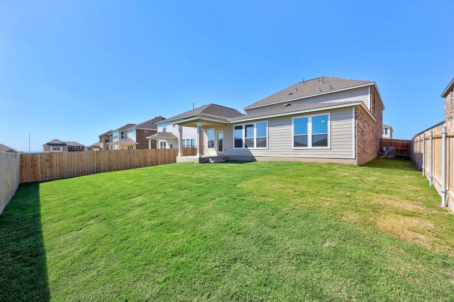 Exterior details and patio area of a home in Salerno - Classic Collection, Round Rock (Image 2).