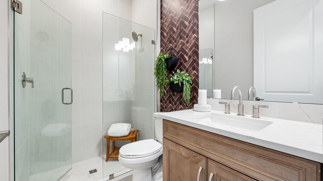 Representative furnished interior of a home built from the Cresta by Taylor Morrison in Esplanade by the Islands, Naples (Image 14).