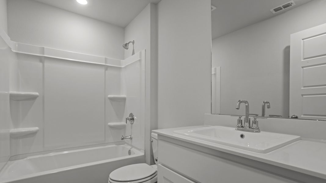 Representative furnished interior of a home built from the ASHBURN by D.R. Horton in Hampton Hills, Abilene (Image 8).