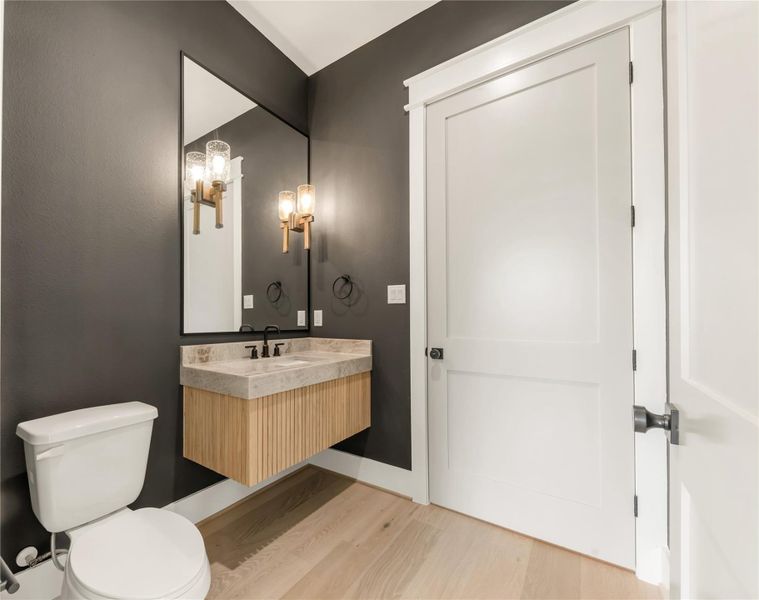 Bathroom with vanity and light wood-type flooring