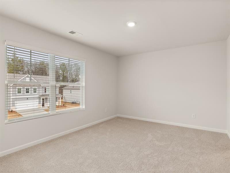 Spacious, unfurnished interior of a new home in Northwoods at Mirror Lake, Villa Rica (Image 18).