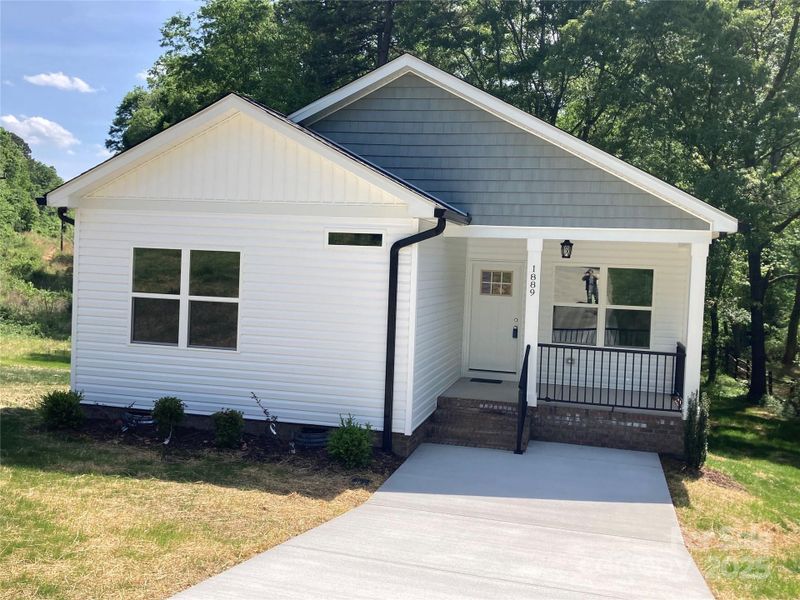 Front exterior of a new home in , Gastonia, NC, highlighting curb appeal (Image 15).