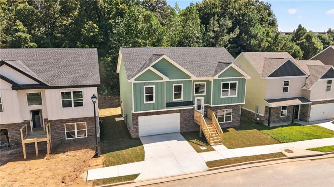 Front exterior of a new home in , Gainesville, GA, highlighting curb appeal (Image 22).