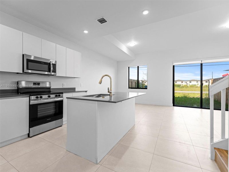 Furnished interior view inside a new home in , Homestead (Image 11). Furnished interior view inside a new home in , Homestead (Image 11).