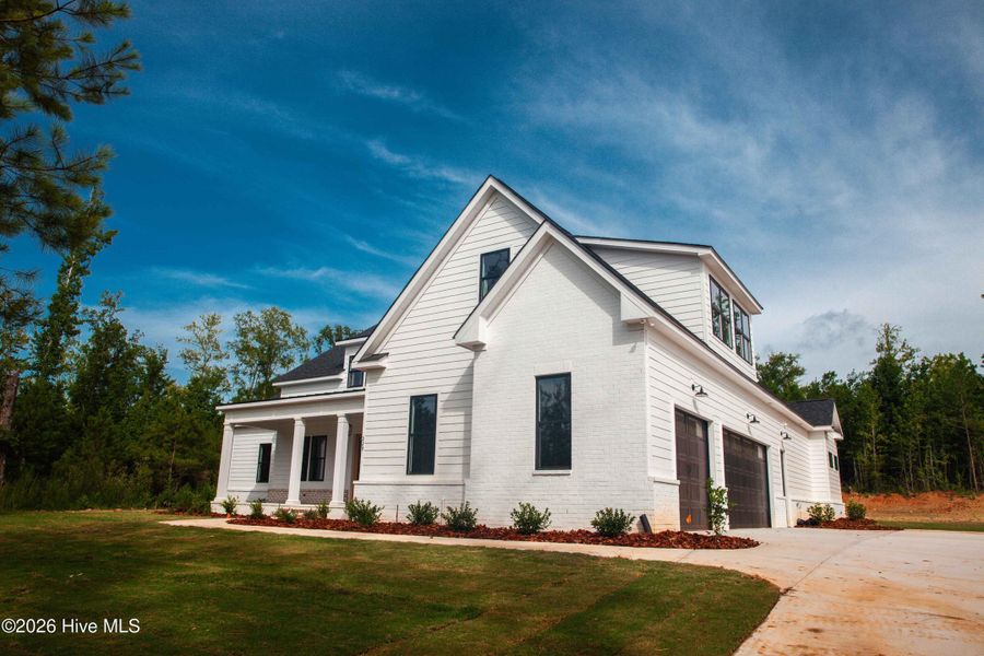 Front exterior of a new home in Marshall Mills, Grovetown, GA, highlighting curb appeal (Image 24).