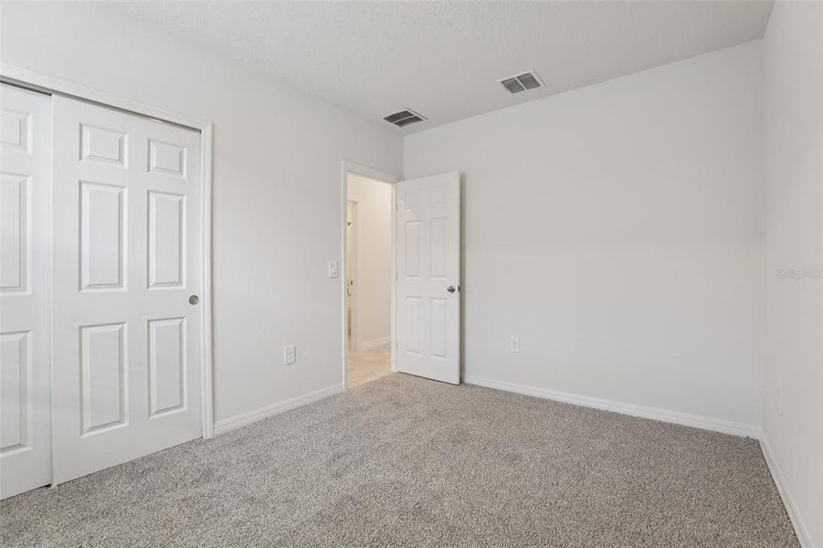 Spacious, unfurnished interior of a new home in Lawson Dunes - Signature Series, Haines City (Image 34).