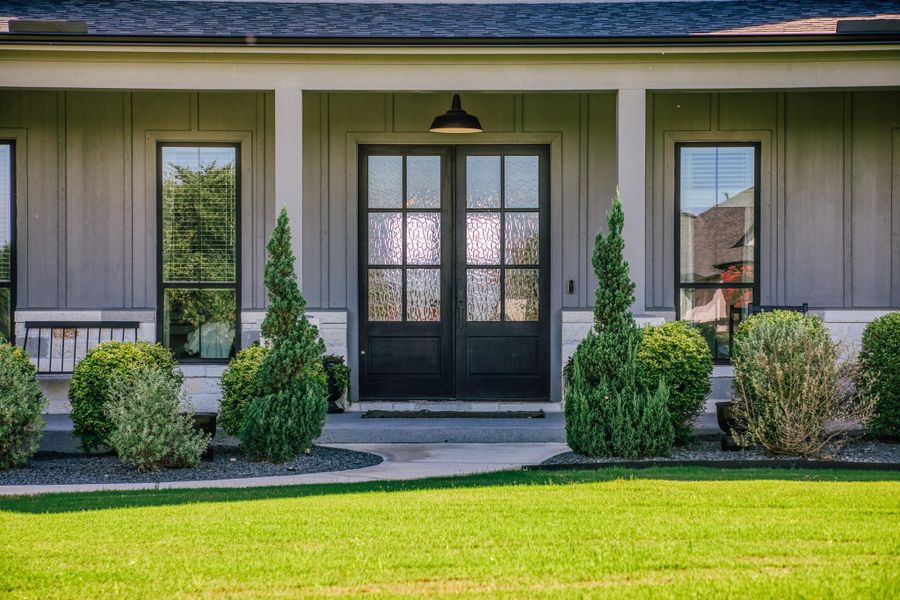 Exterior details and patio area of a home in , Chappell Hill (Image 21).