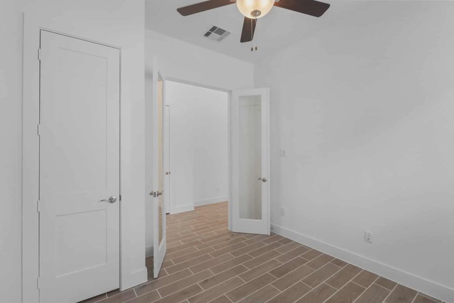 Representative unfurnished interior of a home built from the Mickelson by Chesmar Homes in Riceland Alley Loads, Mont Belvieu (Image 90).