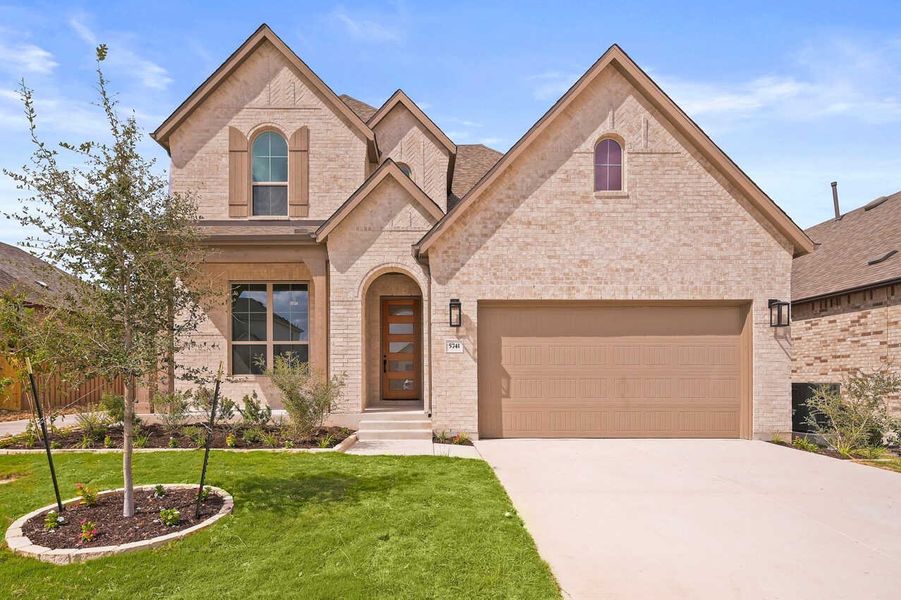 Front exterior of a new home in Mayfair: 50ft. lots, New Braunfels, TX, highlighting curb appeal (Image 1). Front exterior of a new home in Mayfair: 50ft. lots, New Braunfels, TX, highlighting curb appeal (Image 1).