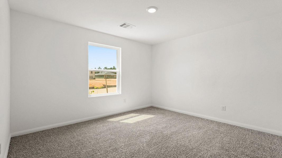 Spacious, unfurnished interior of a new home in McCrorey Trails, Conroe (Image 7).