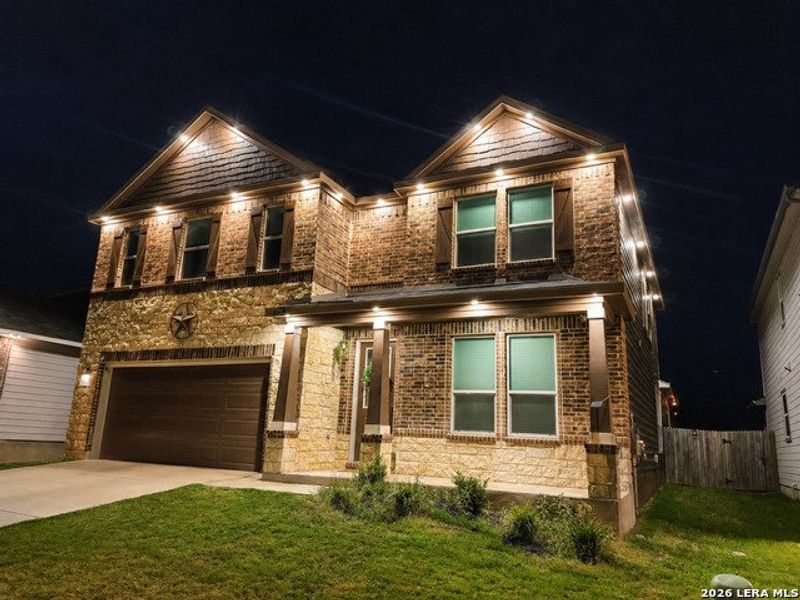 Front exterior of a new home in Canyon Crest, San Antonio, TX, highlighting curb appeal (Image 22). Front exterior of a new home in Canyon Crest, San Antonio, TX, highlighting curb appeal (Image 22).