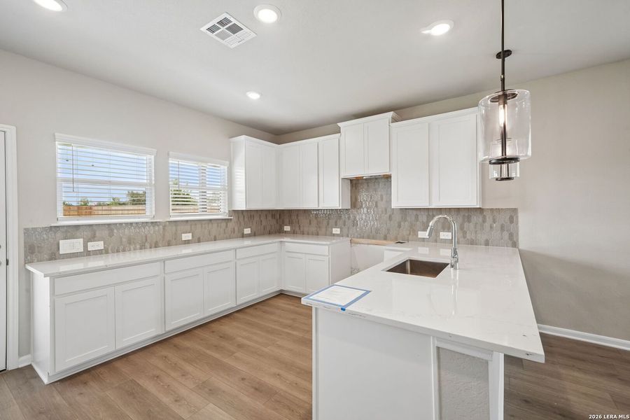 Furnished interior view inside a new home in Thomas Pond, San Antonio (Image 11).