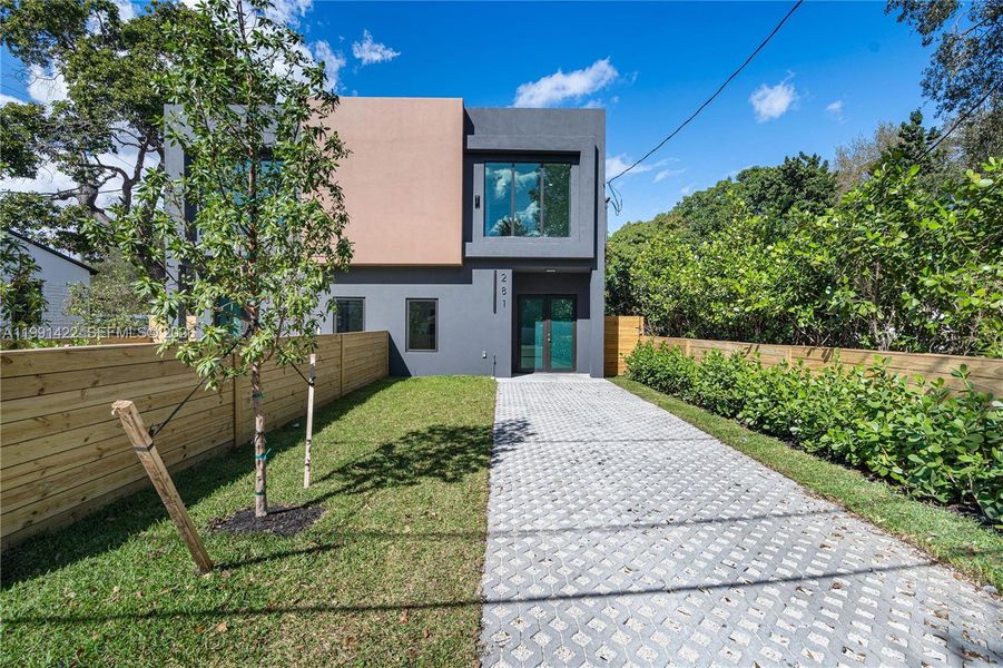 Front exterior of a new home in , Miami, FL, highlighting curb appeal (Image 27).
